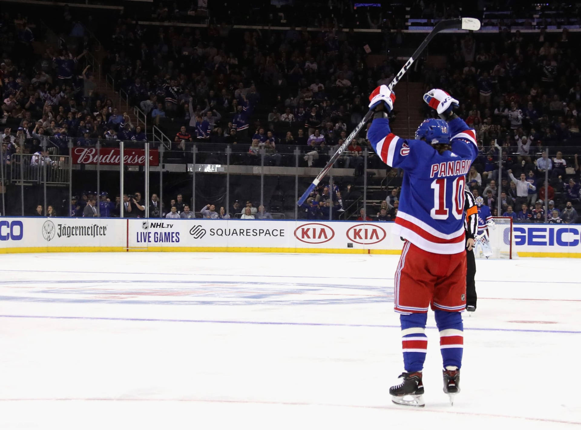 Caption: Artemi Panarin Celebrating A Victory On Ice