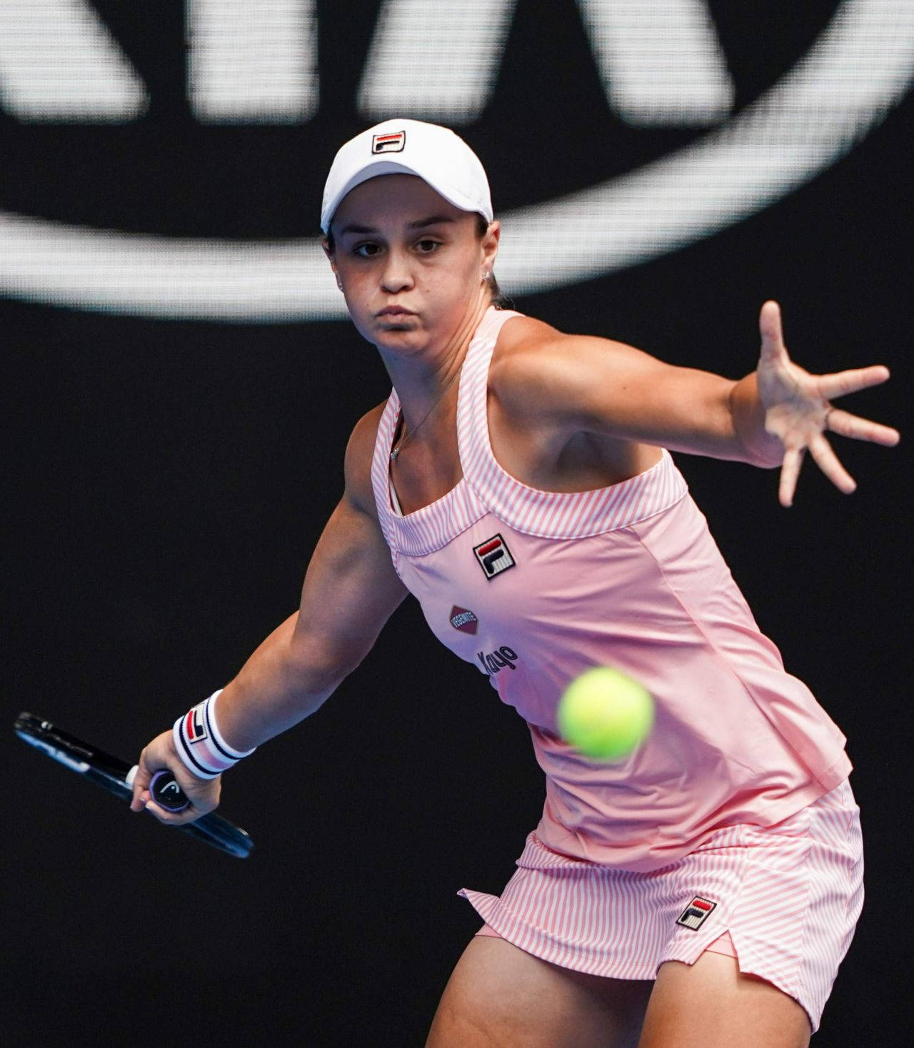 Caption: Ashleigh Barty In Action During Tennis Match Background