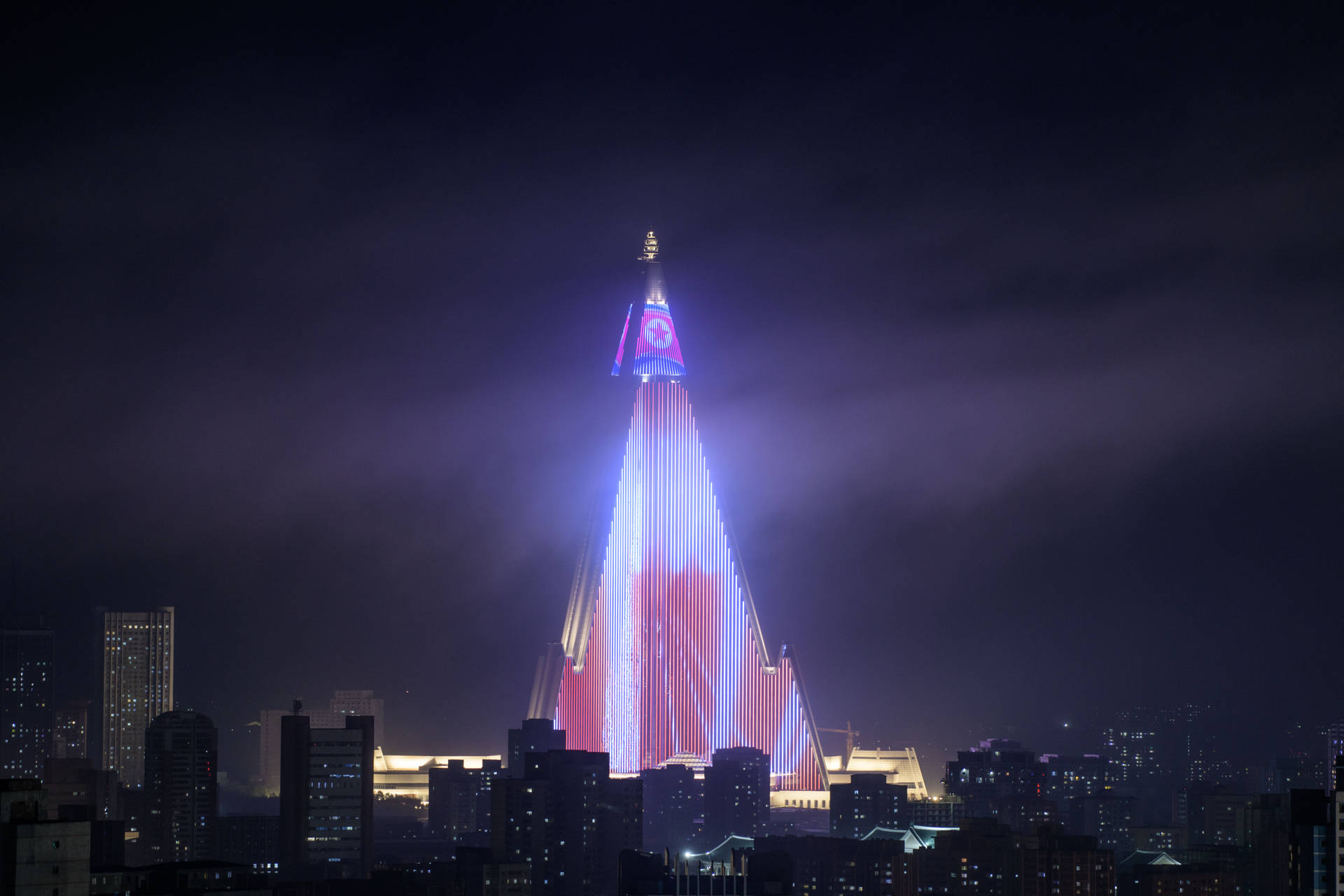 Caption: Astonishing Night View Of Ryugyong Hotel, Pyongyang Background