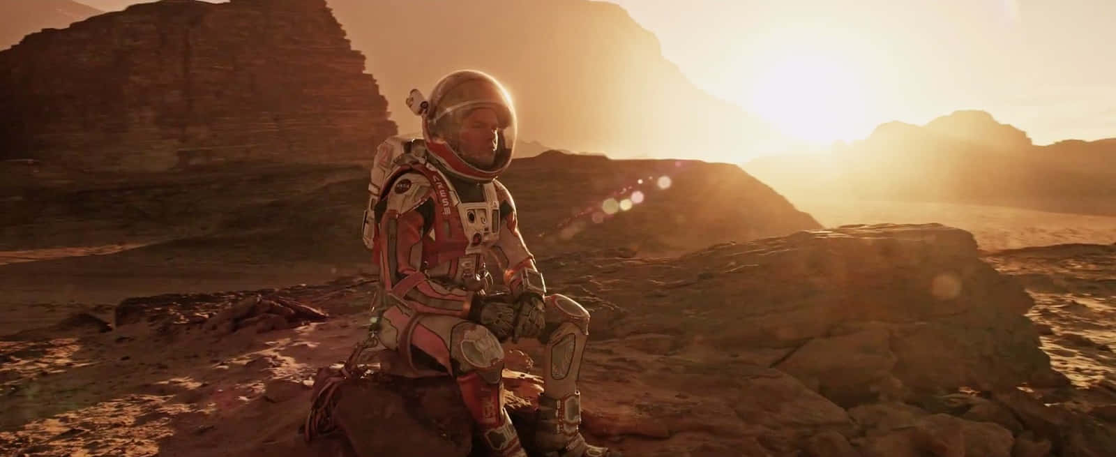 Caption: Astronaut Mark Watney Exploring Mars In The Martian Movie Background