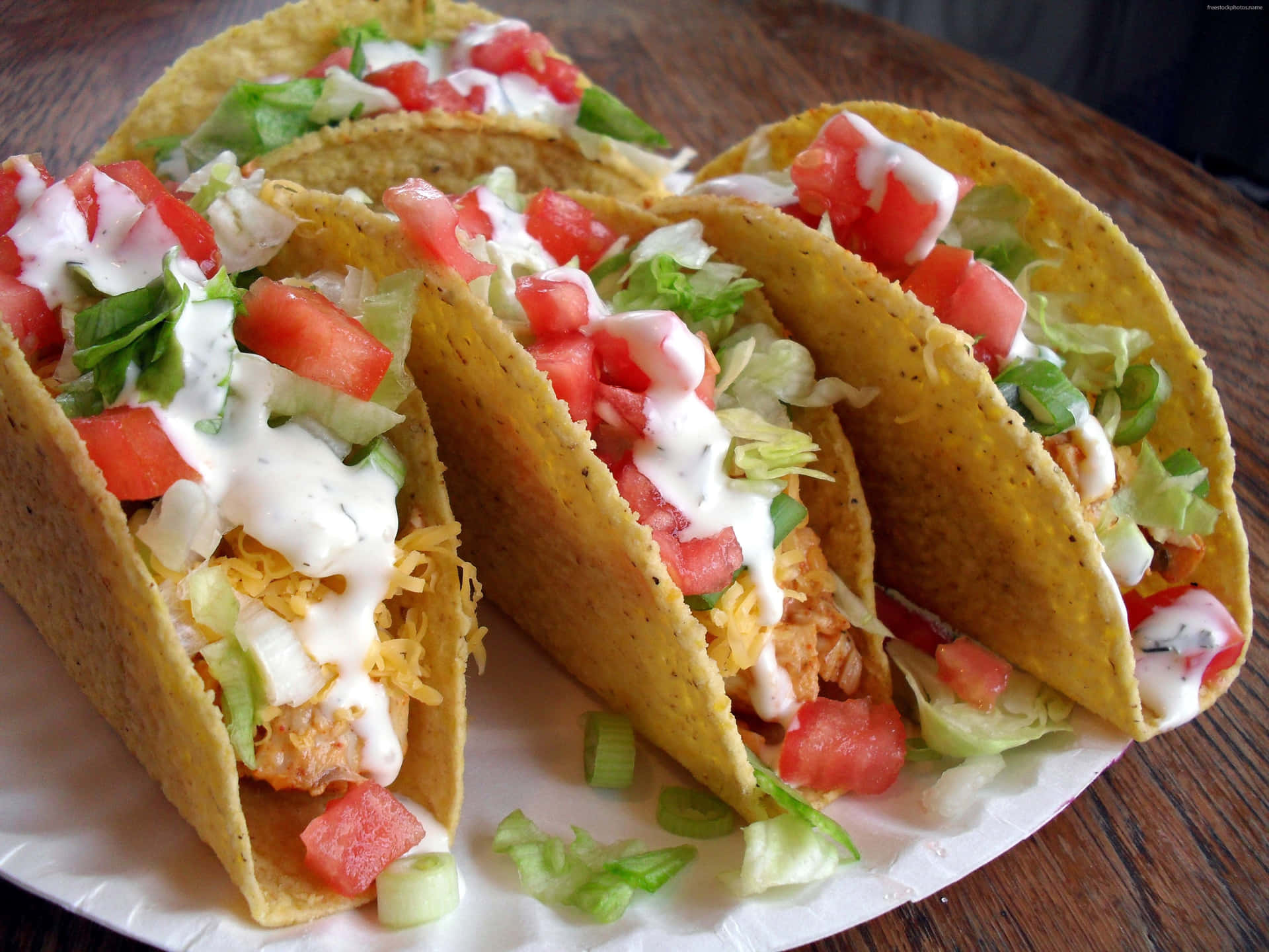 Caption: Authentic Mexican Cuisine On A White Plate Background