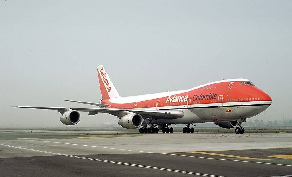 Caption: Avianca Airline Boeing 747 Cruising In The Azure Sky