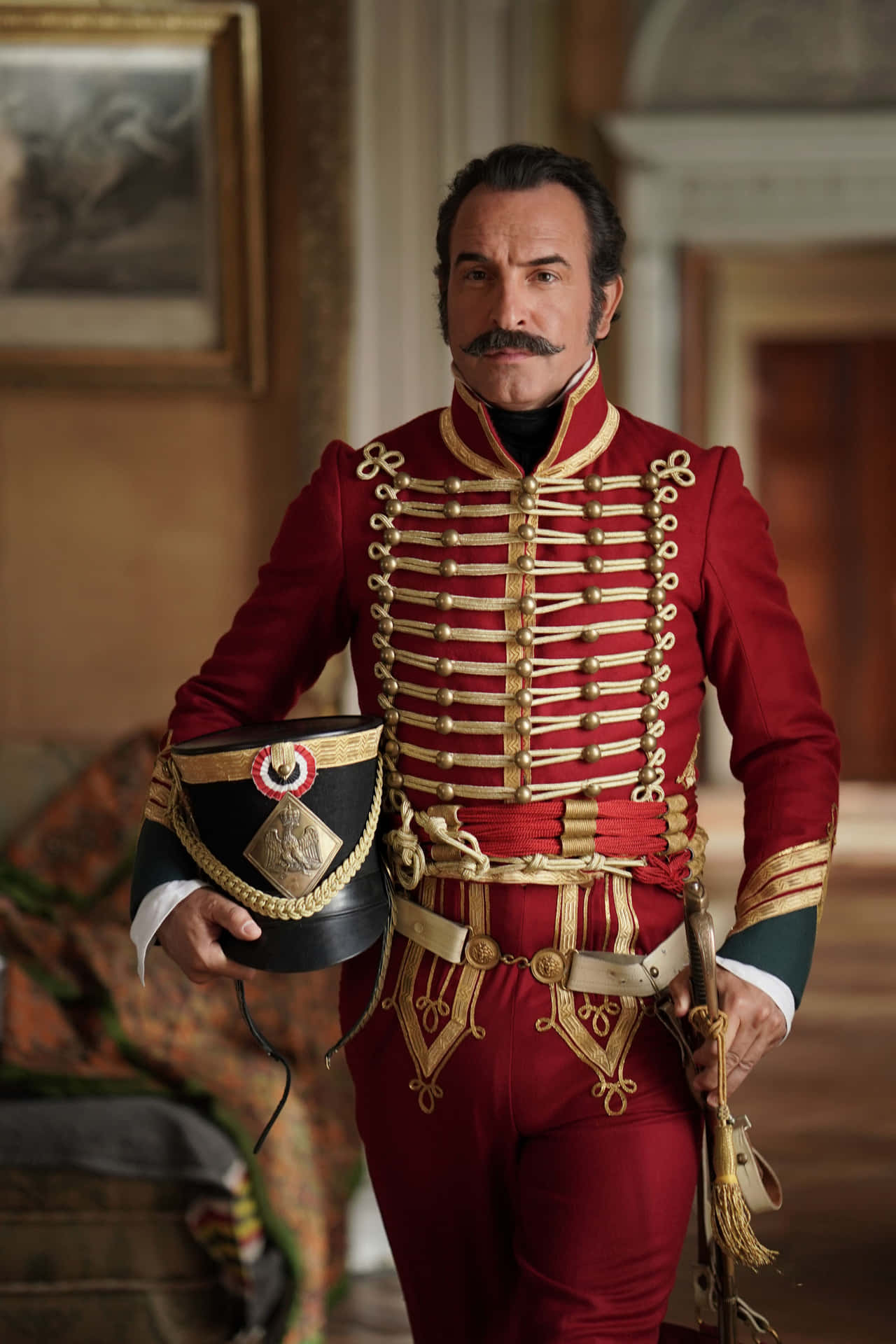 Caption: Award-winning French Actor, Jean Dujardin, In A Charismatic Pose Background