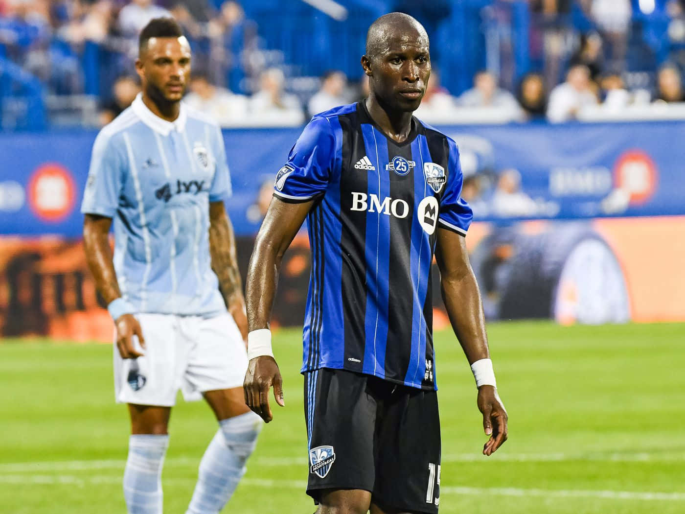 Caption: Ballou Tabla Showcasing His Skills At A Cf Montreal Match Background