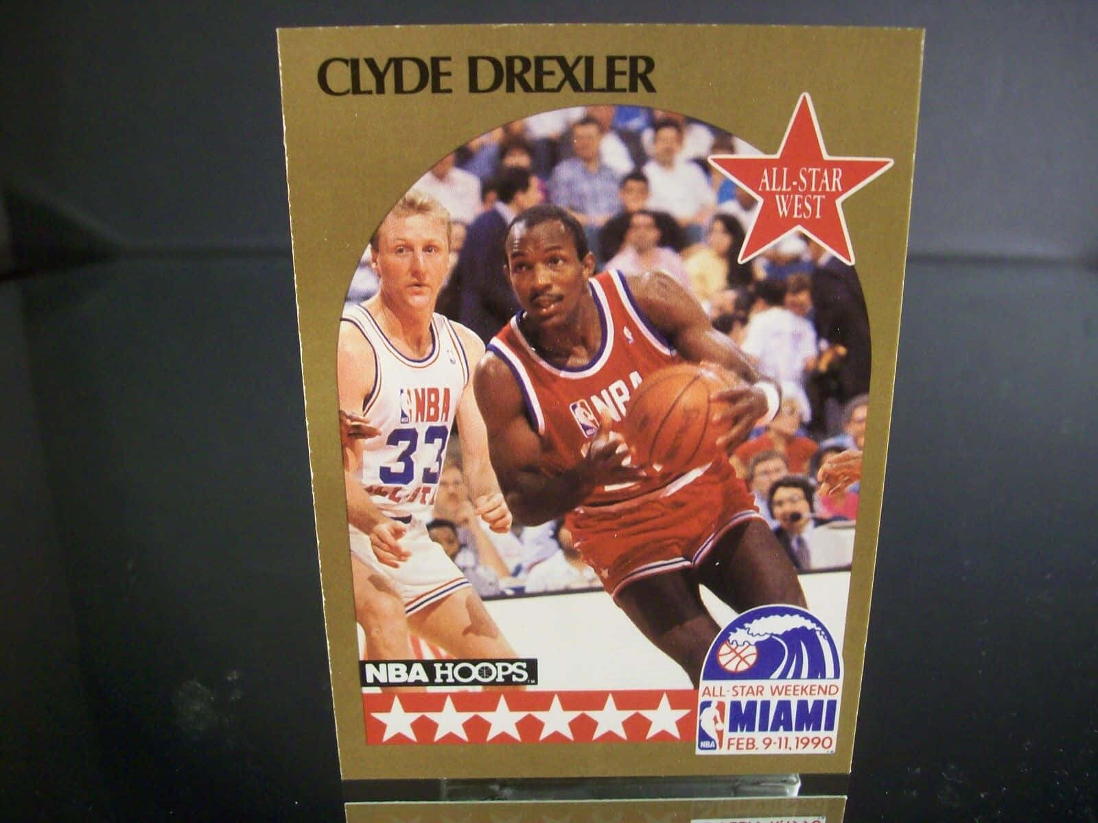 Caption: Basketball Legend Clyde Drexler In Action Background