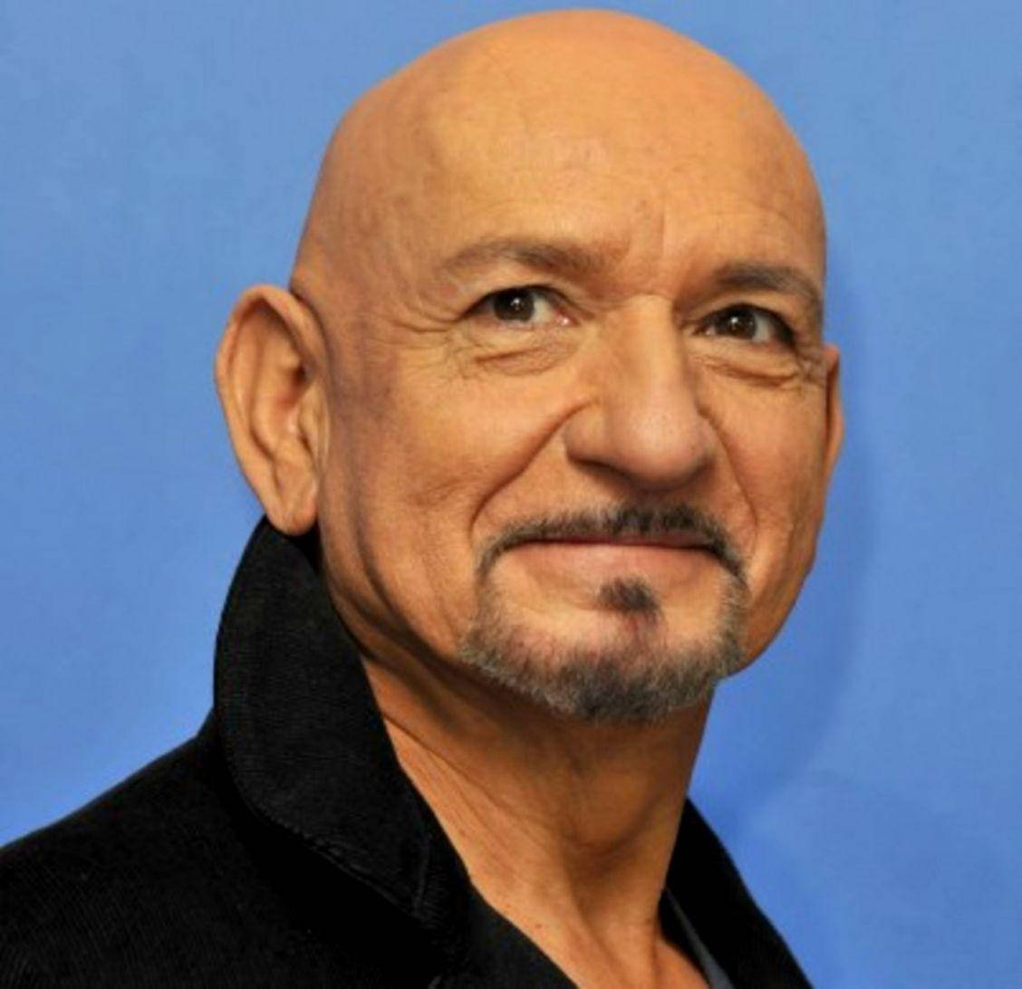 Caption: Ben Kingsley Flashing A Warm Smile In A Portrait Shot