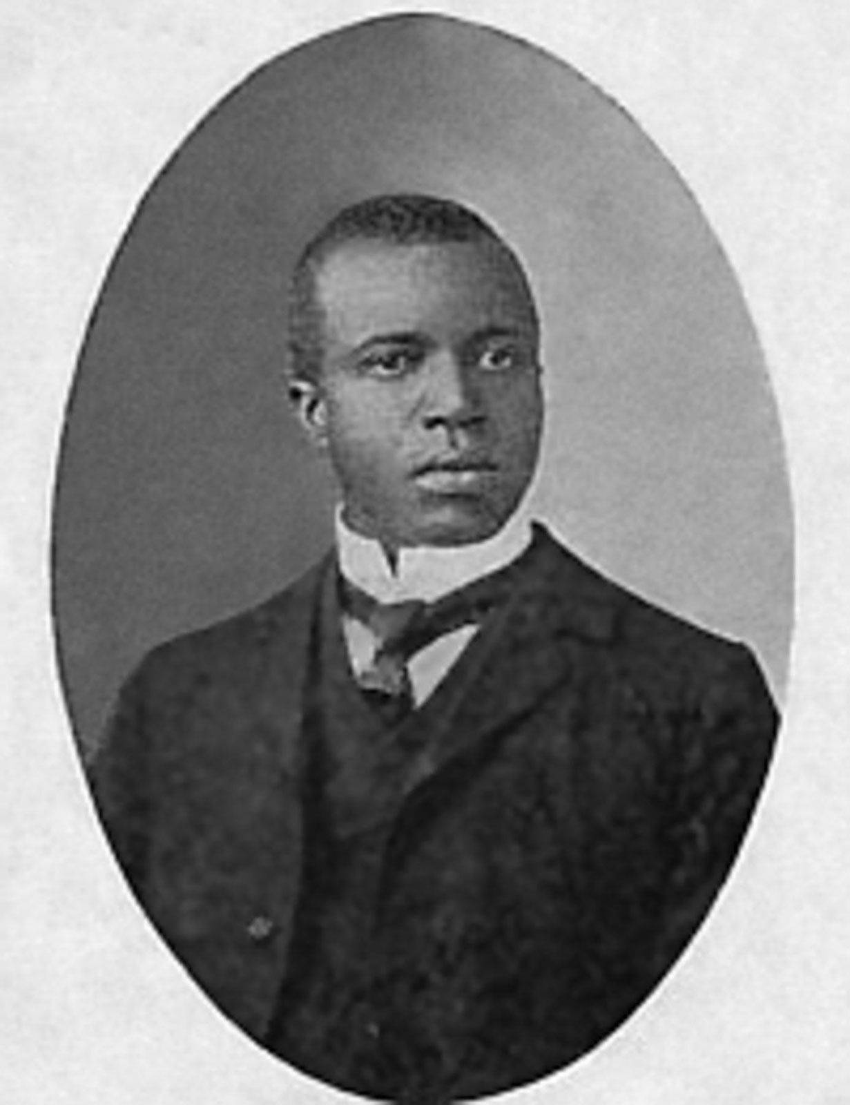 Caption: Black And White Portrait Of Scott Joplin, The 'king Of Ragtime' Background