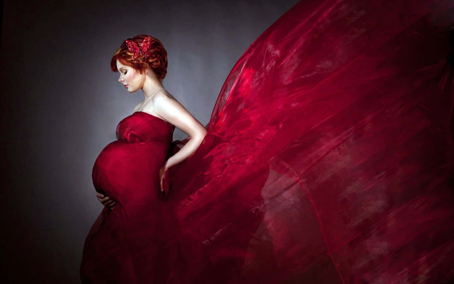 Caption: Blooming In Red - A Radiant Pregnant Woman Background