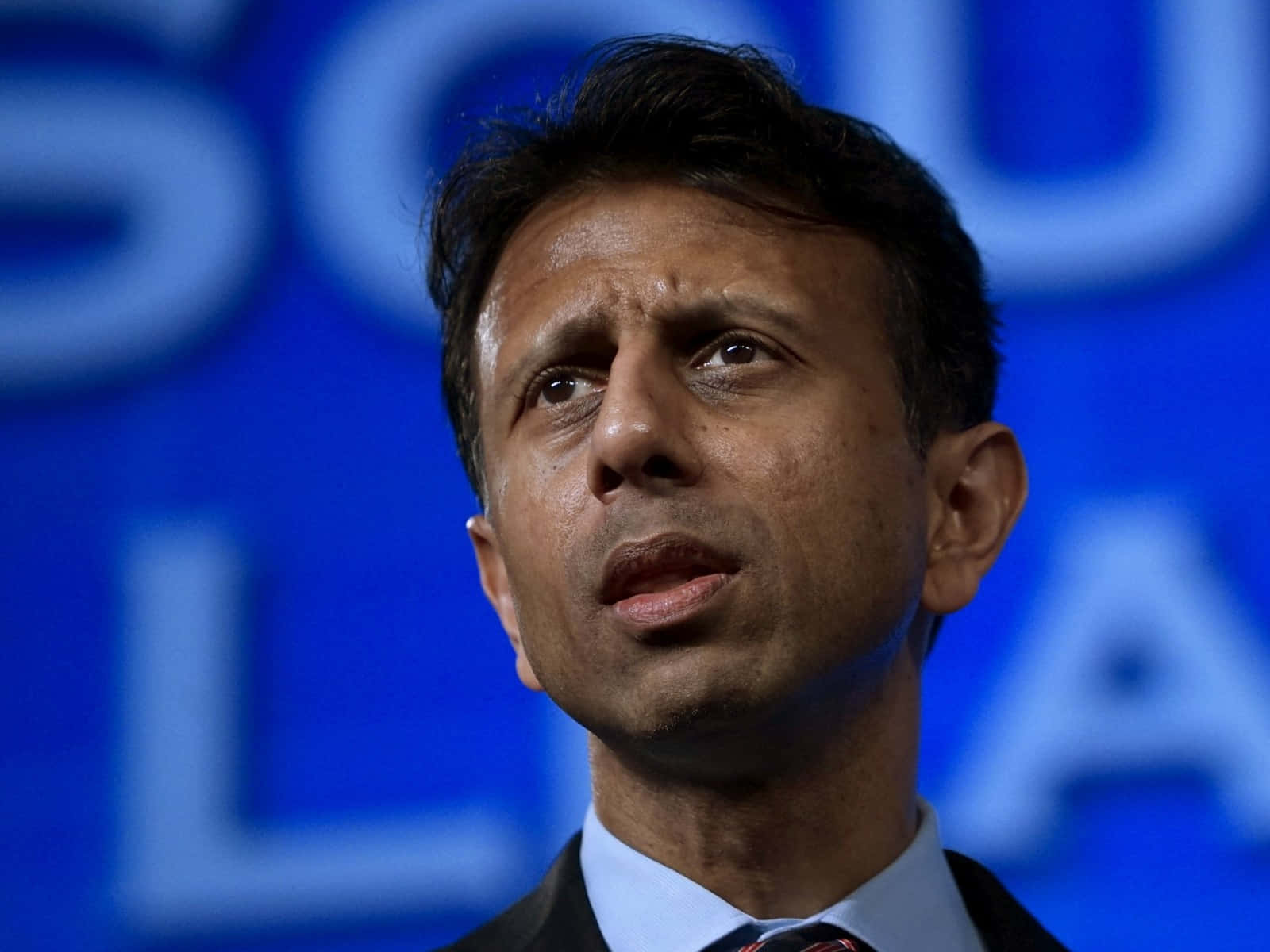 Caption: Bobby Jindal In A Professional Portrait Session Background