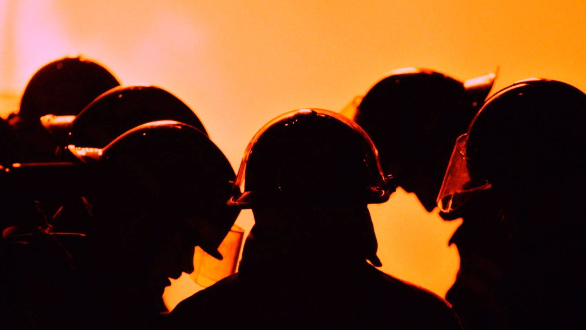 Caption: Brave Firefighters In Action