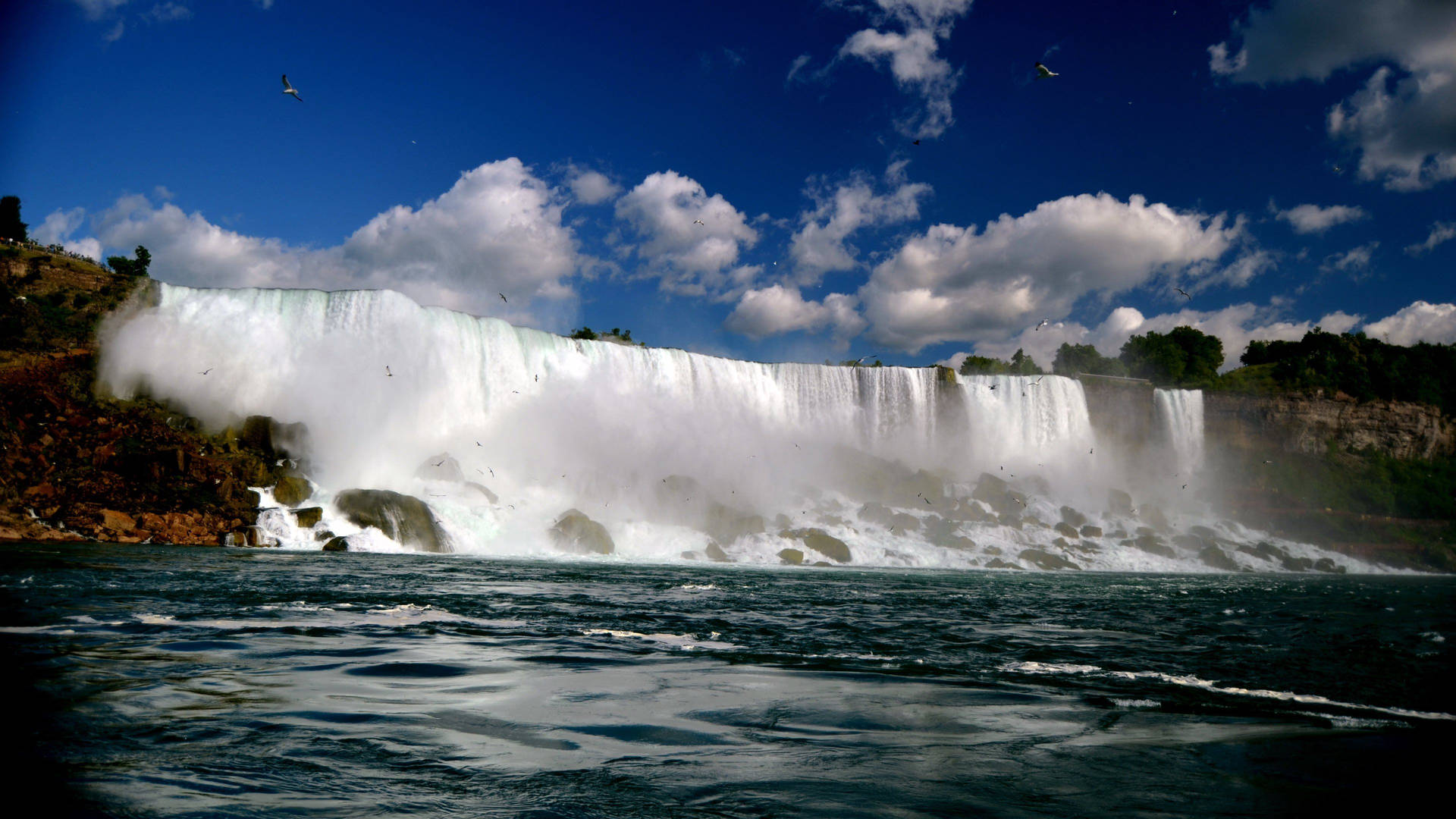 Caption: Breathtaking View Of The Vibrant Niagara Falls Background
