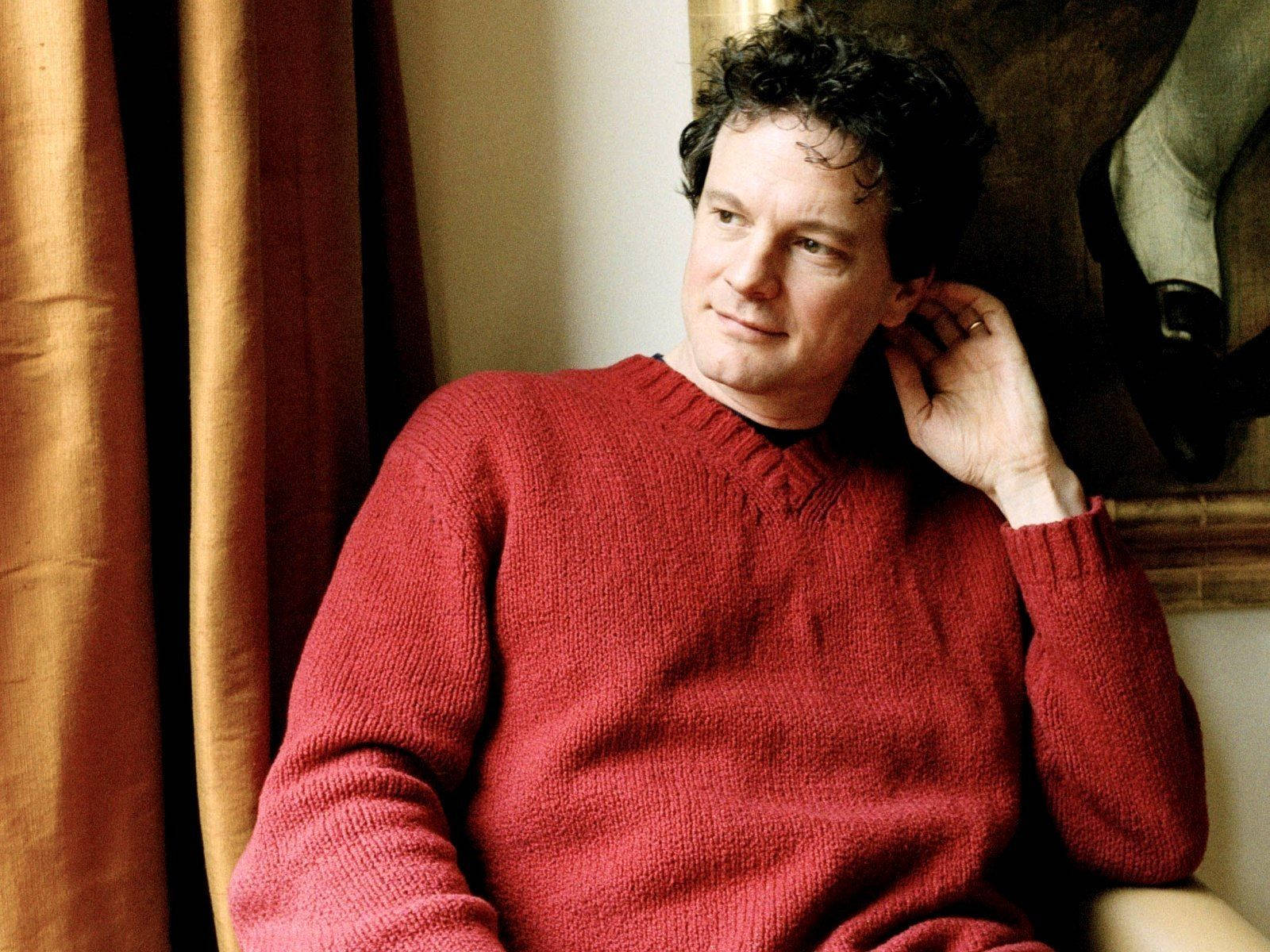 Caption: British Actor Colin Firth In Photoshoot Background