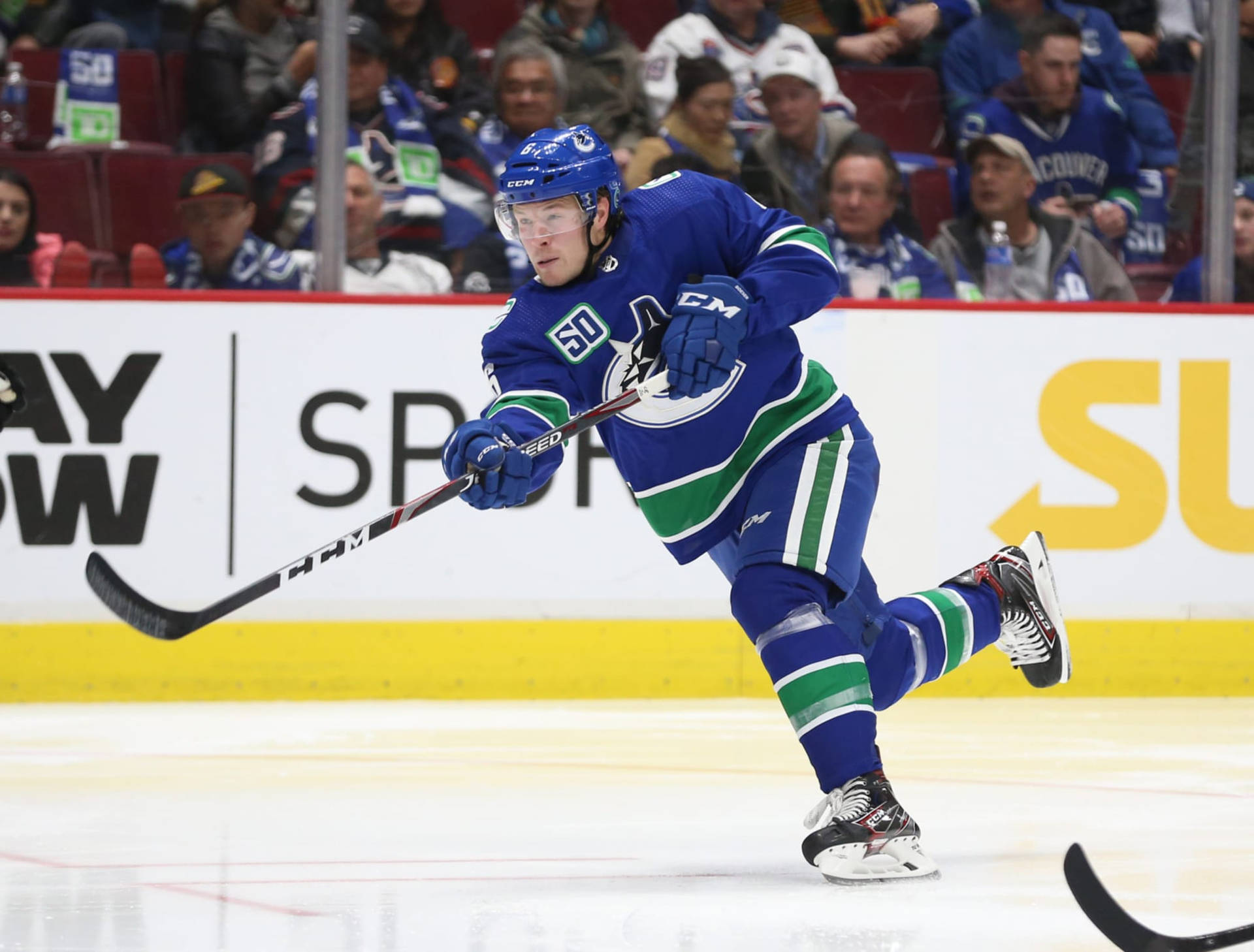 Caption: Brock Boeser In Action For Vancouver Canucks Against Los Angeles Kings Background