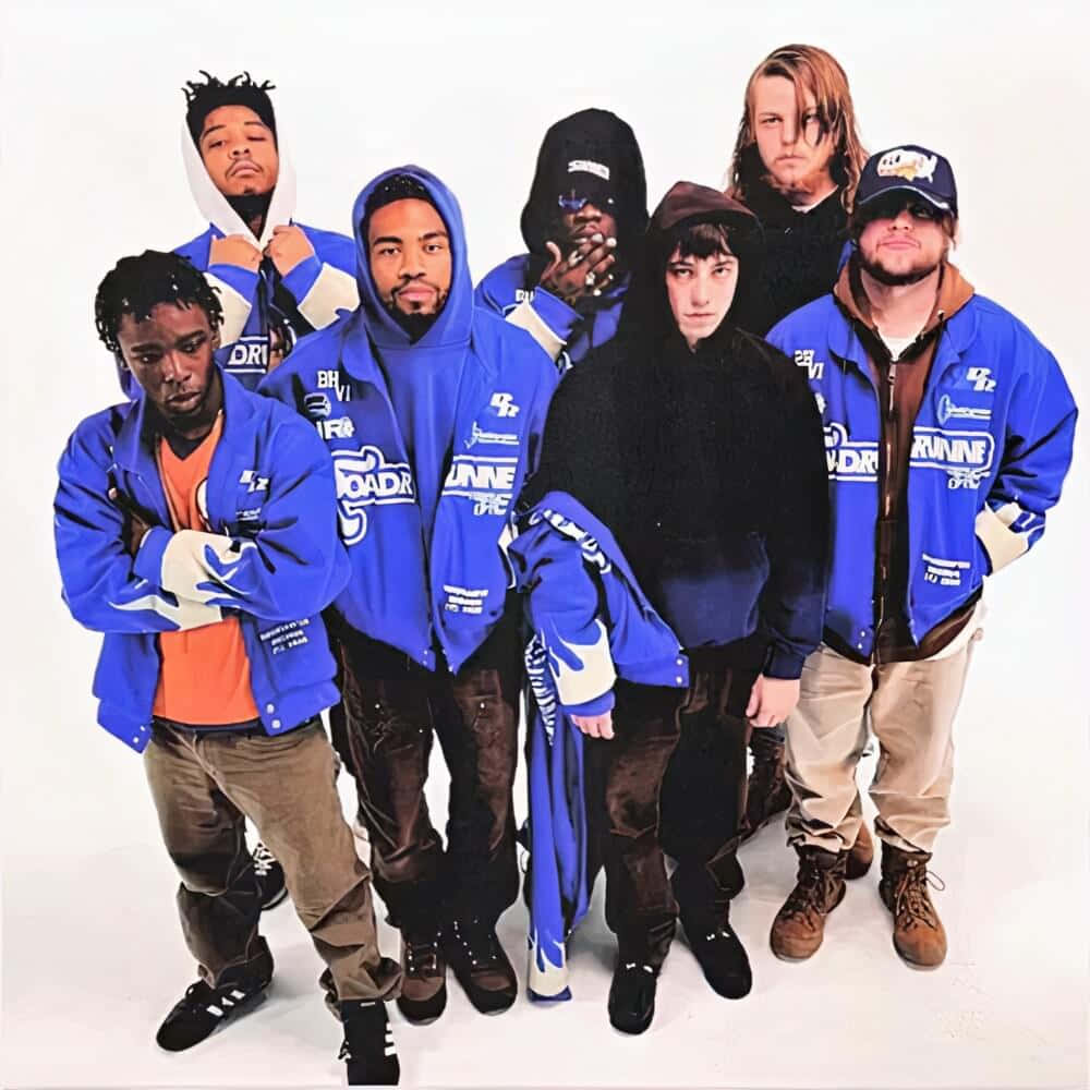 Caption: Brockhampton Group Photo On Colorful Background Background