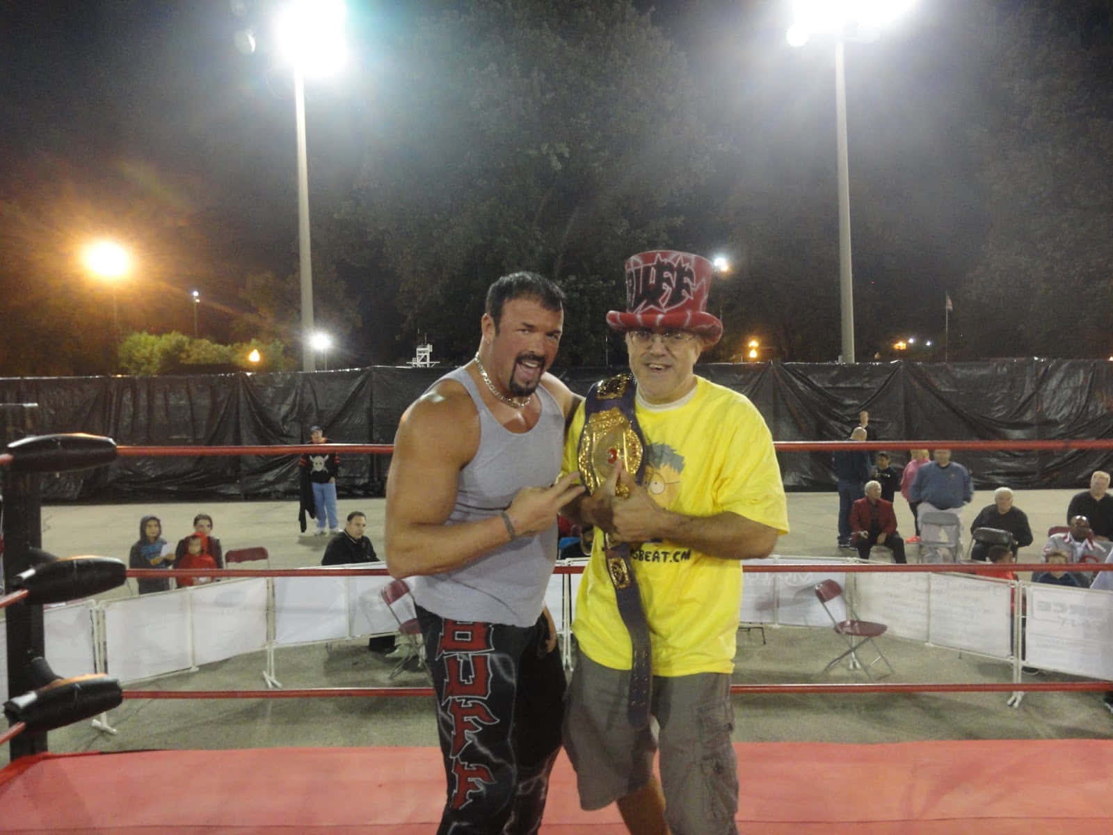 Caption: Buff Bagwell Posing For Fan's Photo Background