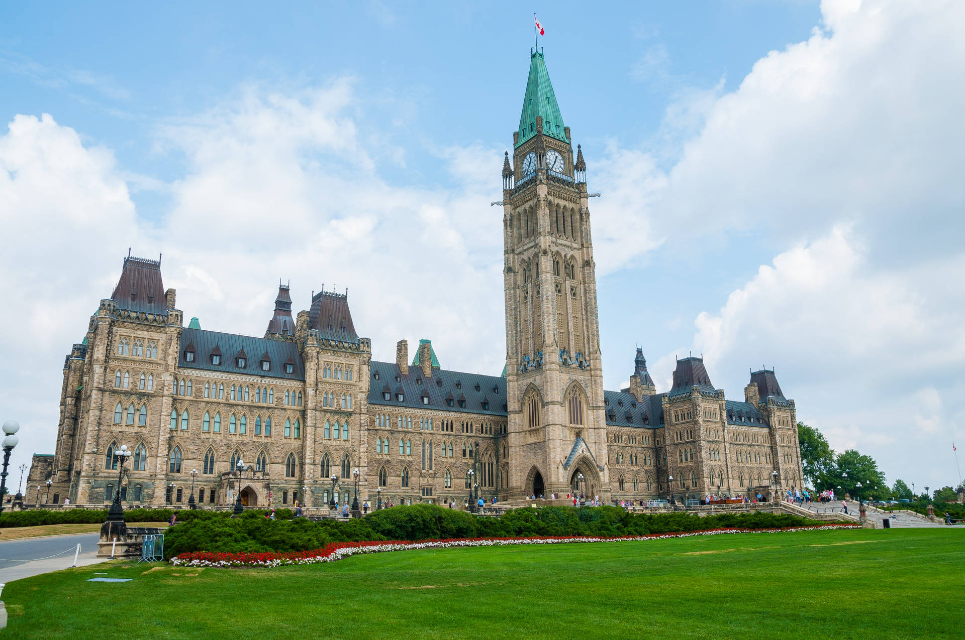 Caption: Canada's Iconic Peace Tower Against Blue Sky