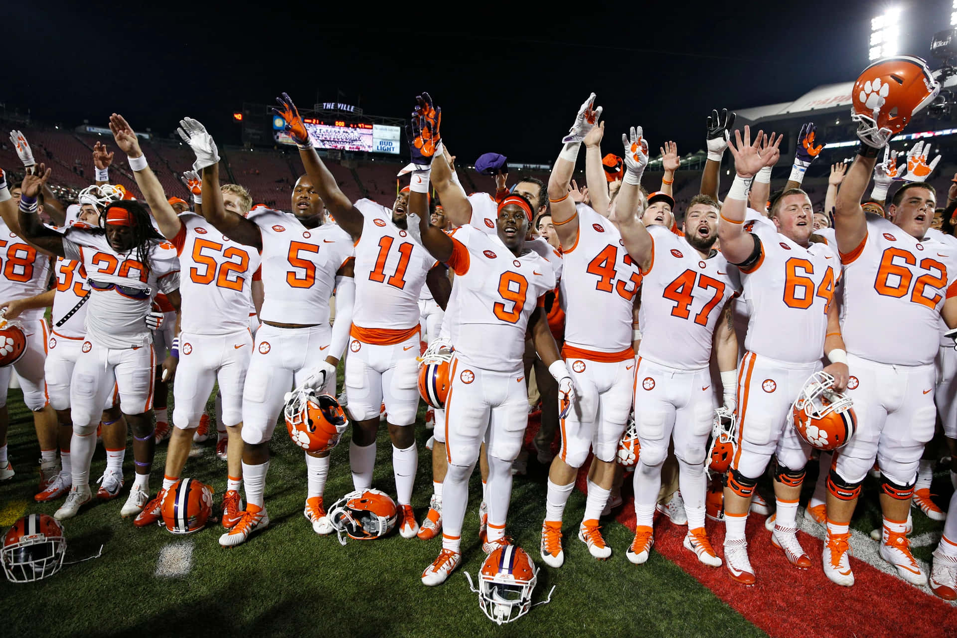 Caption: Captivating Action In Clemson Tigers Football Match Background