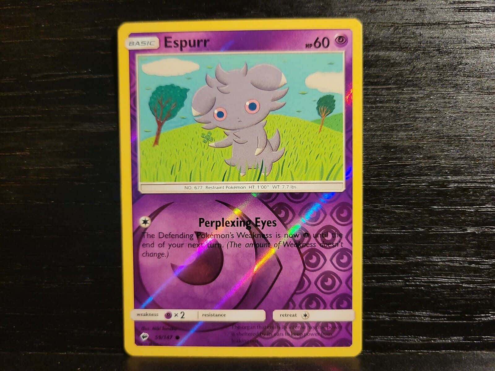 Caption: Captivating Gaze - Rare Espurr Pokemon Trading Card Background