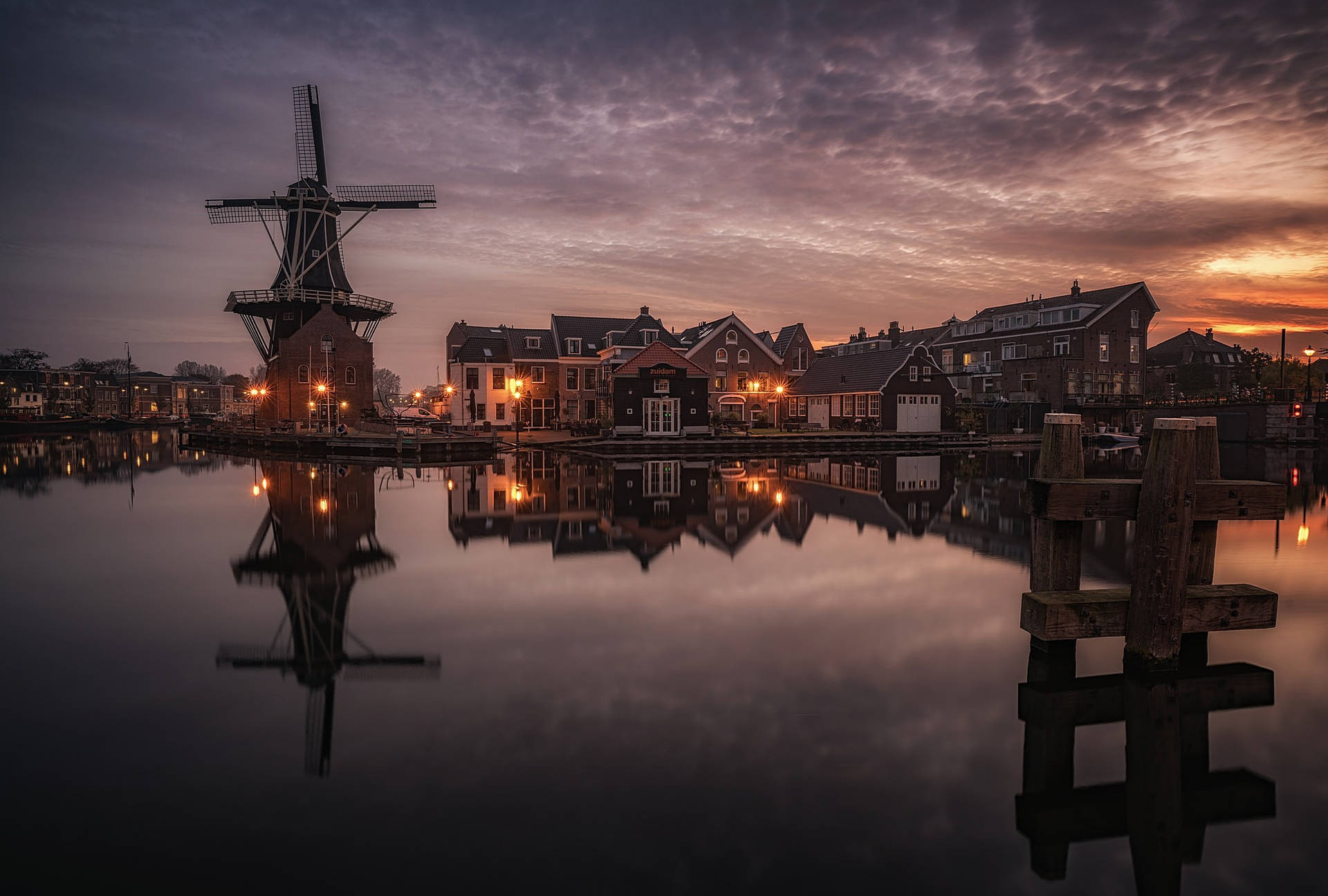 Caption: Captivating Sight Of De Adriaan Windmill, Netherlands Background