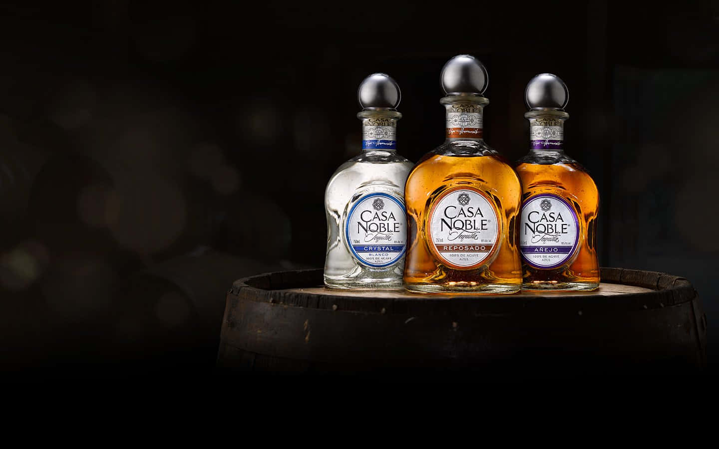 Caption: Casa Noble Tequilas – Anejo, Crystal Blanco, Reposado In Flute Glass Background