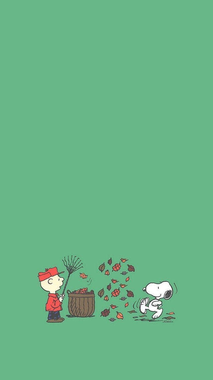 Caption: Celebrate The Christmas Spirit With This Joyful Snoopy Wallpaper For Iphone