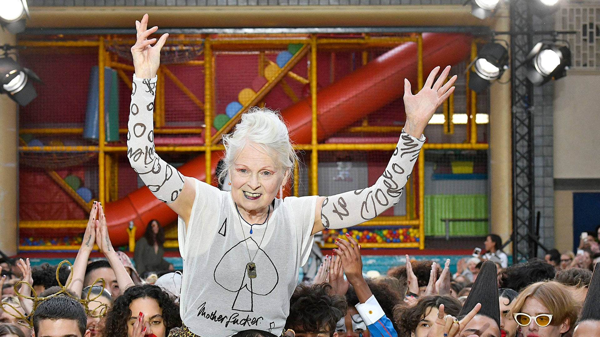 Caption: Celebrated Fashion Icon - Vivienne Westwood Background