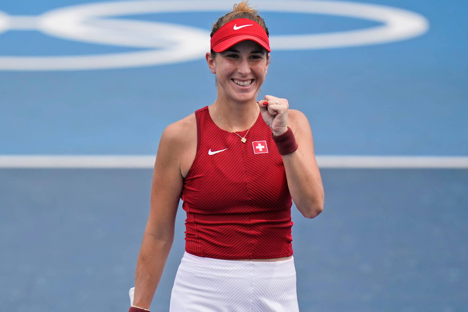 Caption: Celebration Time! Belinda Bencic's Excited Fist Pump Background