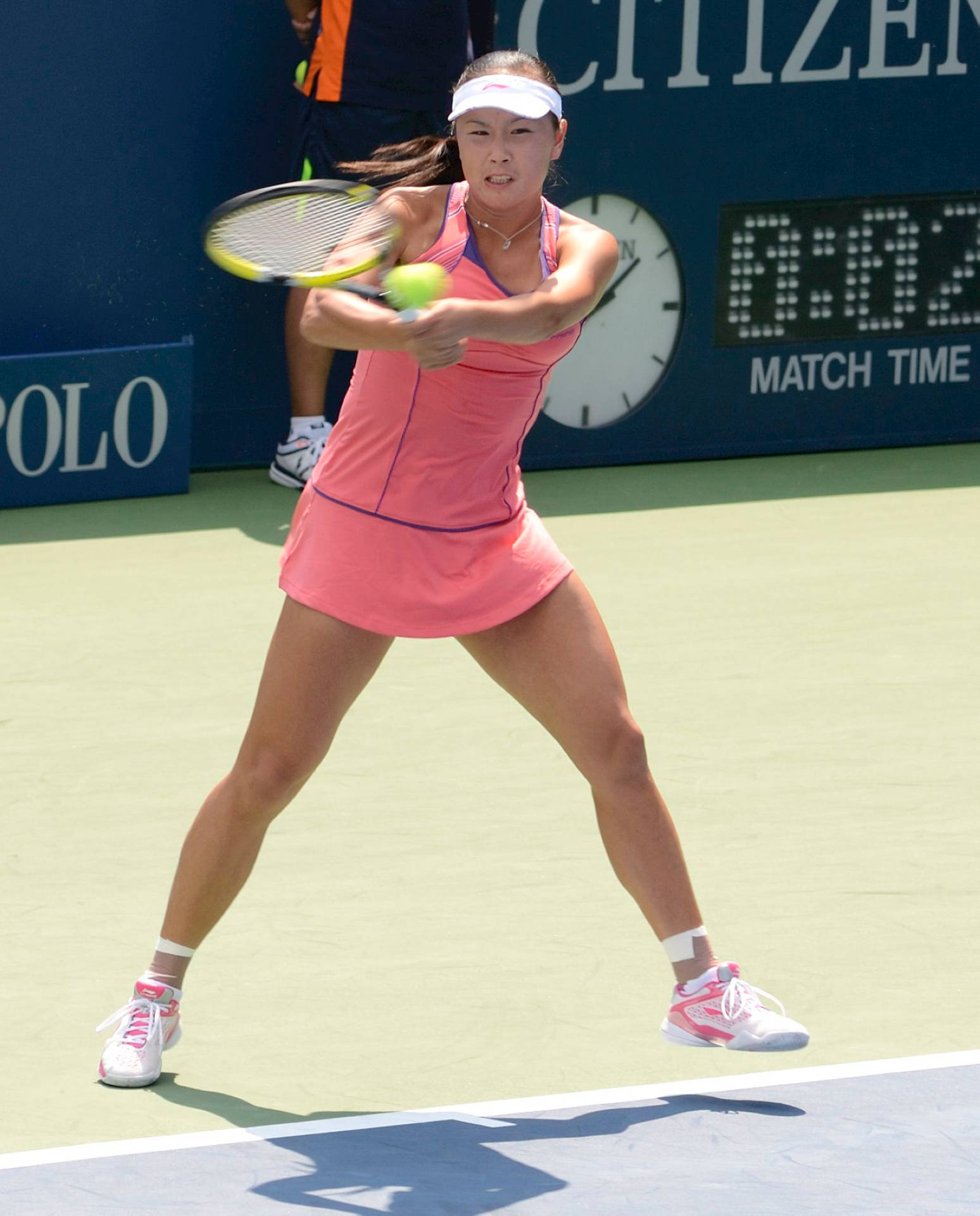 Caption: Chinese Tennis Star, Shuai Peng, In Action Background