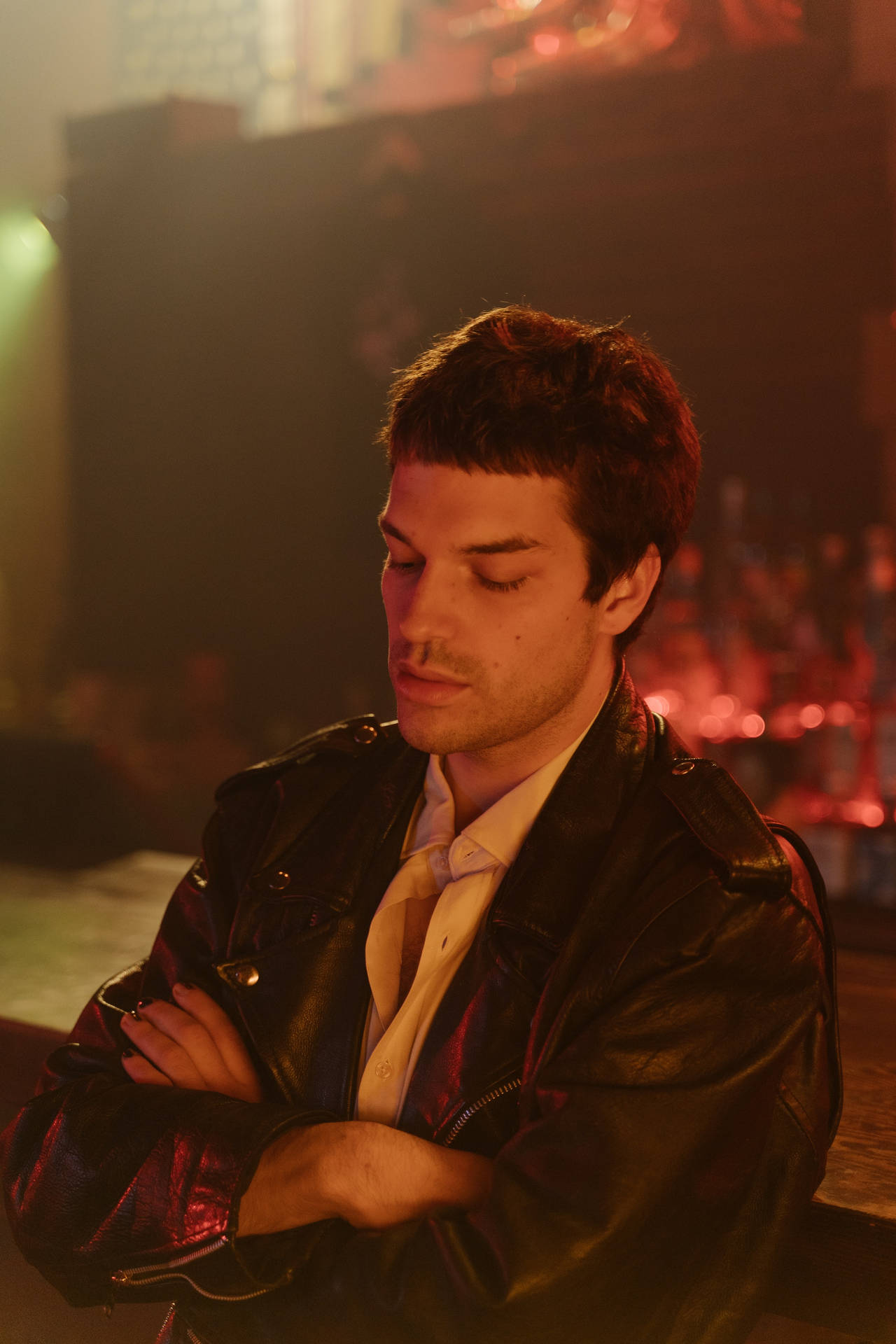 Caption: Classy Urban Man Posing In Leather Jacket Background