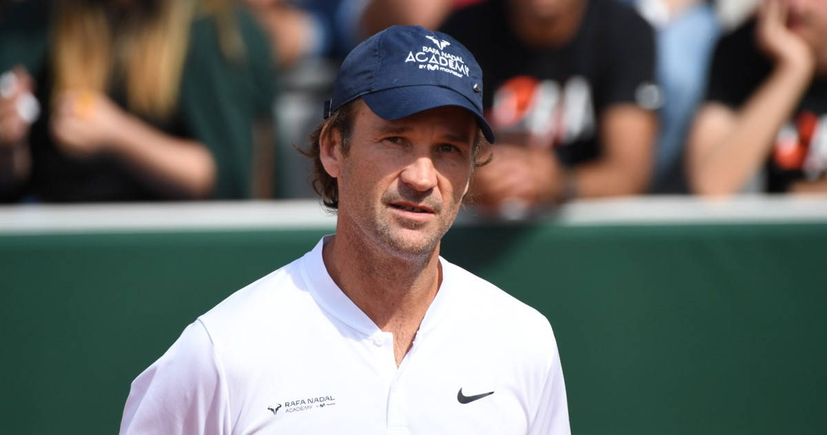 Caption: Close-up Portrait Of Carlos Moya, Tennis Legend Background