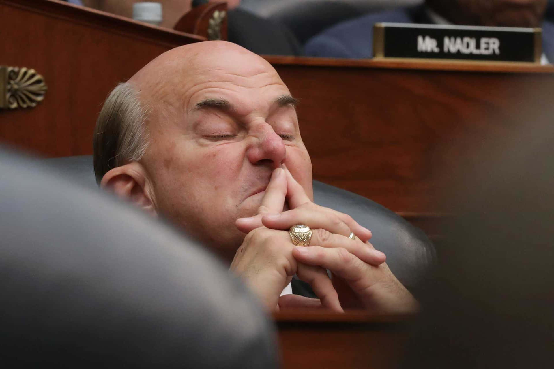 Caption: Congressman Louie Gohmert Scrunching His Nose