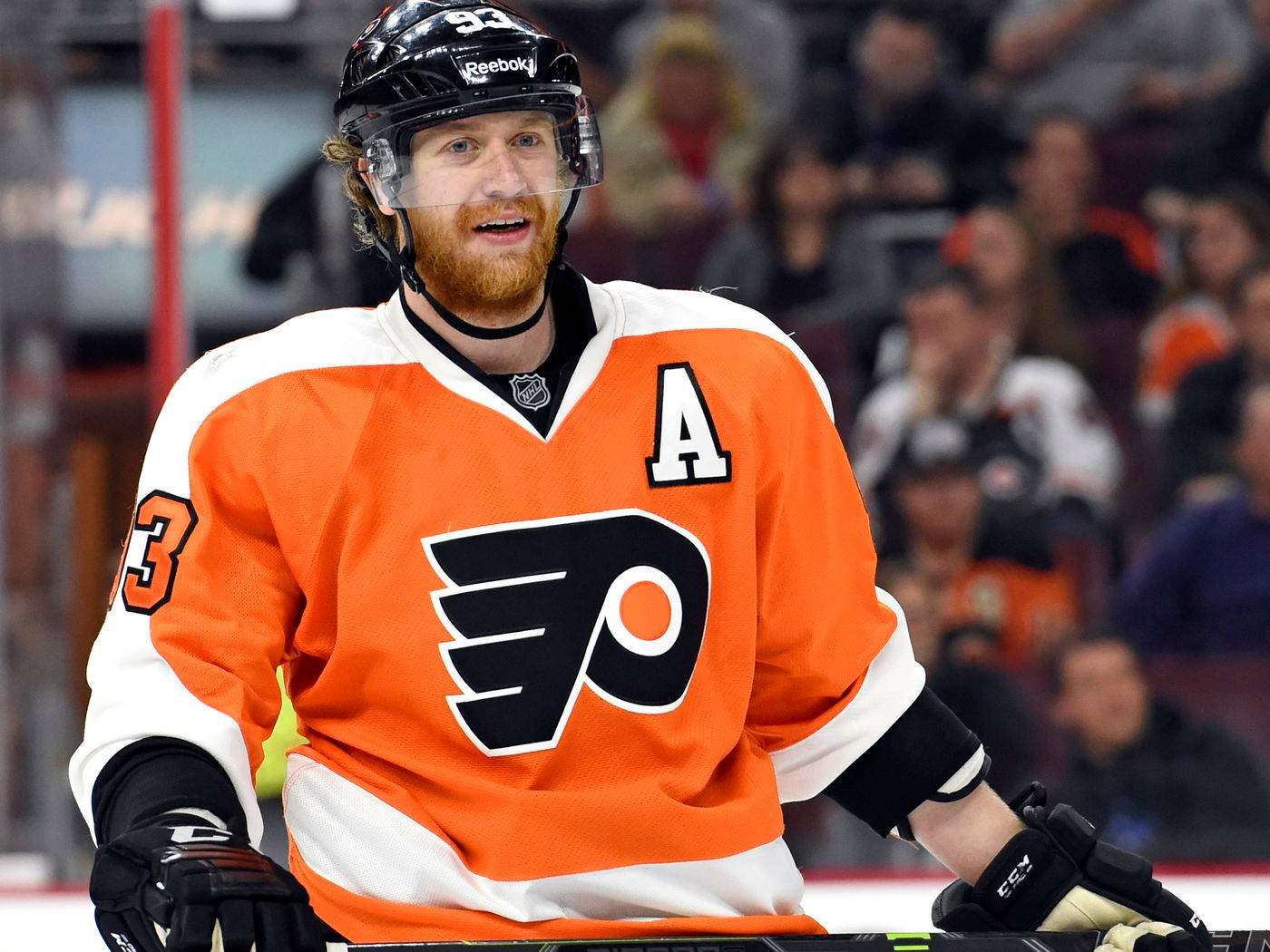 Caption: Czech Professional Ice Hockey Player Jakub Voracek Happily Playing On The Hockey Rink. Background