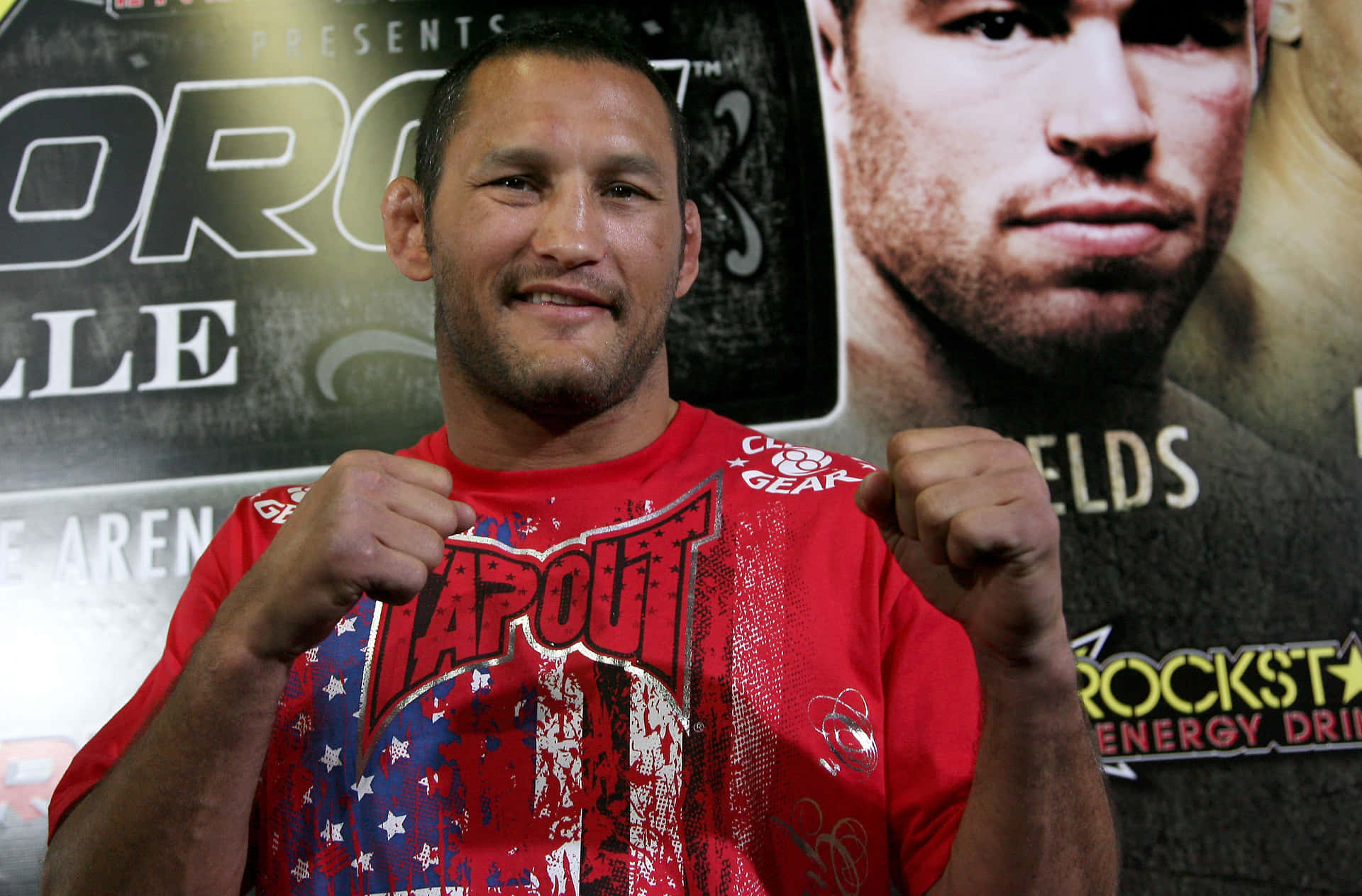 Caption: Dan Henderson, Legendary Mixed Martial Art Fighter In Action Background