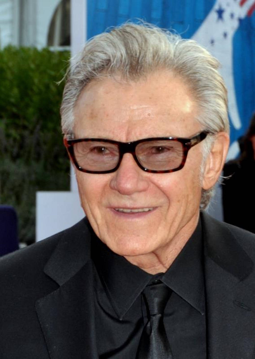 Caption: Dashing Harvey Keitel In An Elegant Black Suit Background