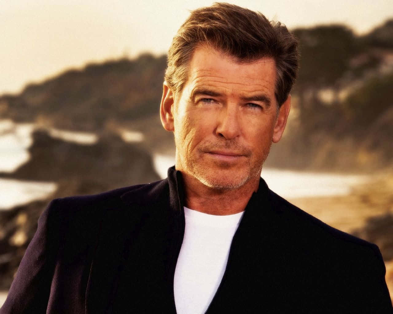 Caption: Dashing Pierce Brosnan In Classic Suit Background