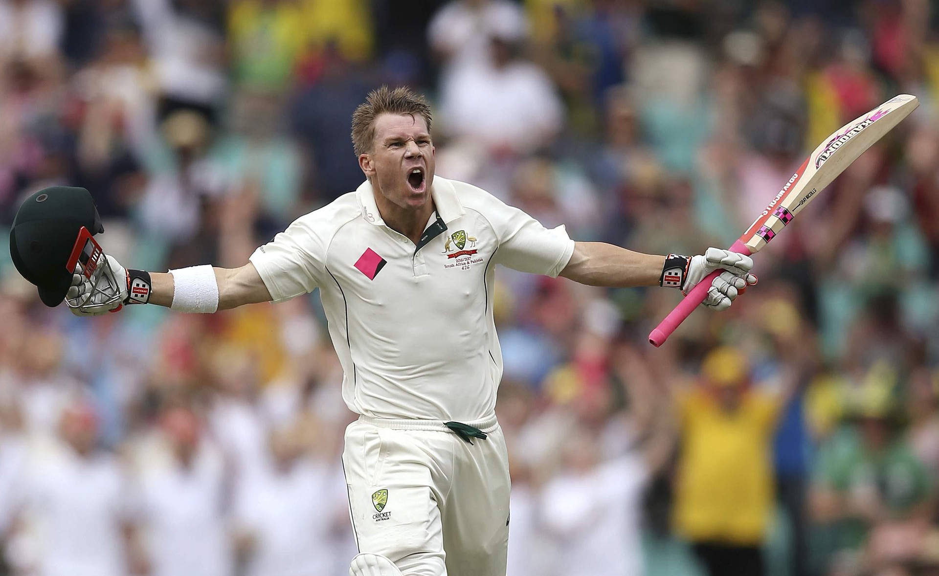 Caption: David Warner Expresses Intensity On The Field Background