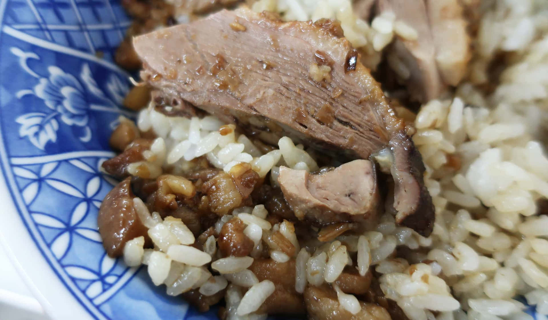 Caption: Delectable Duck Rice At Duck Zhen, Kaohsiung, Taiwan Background