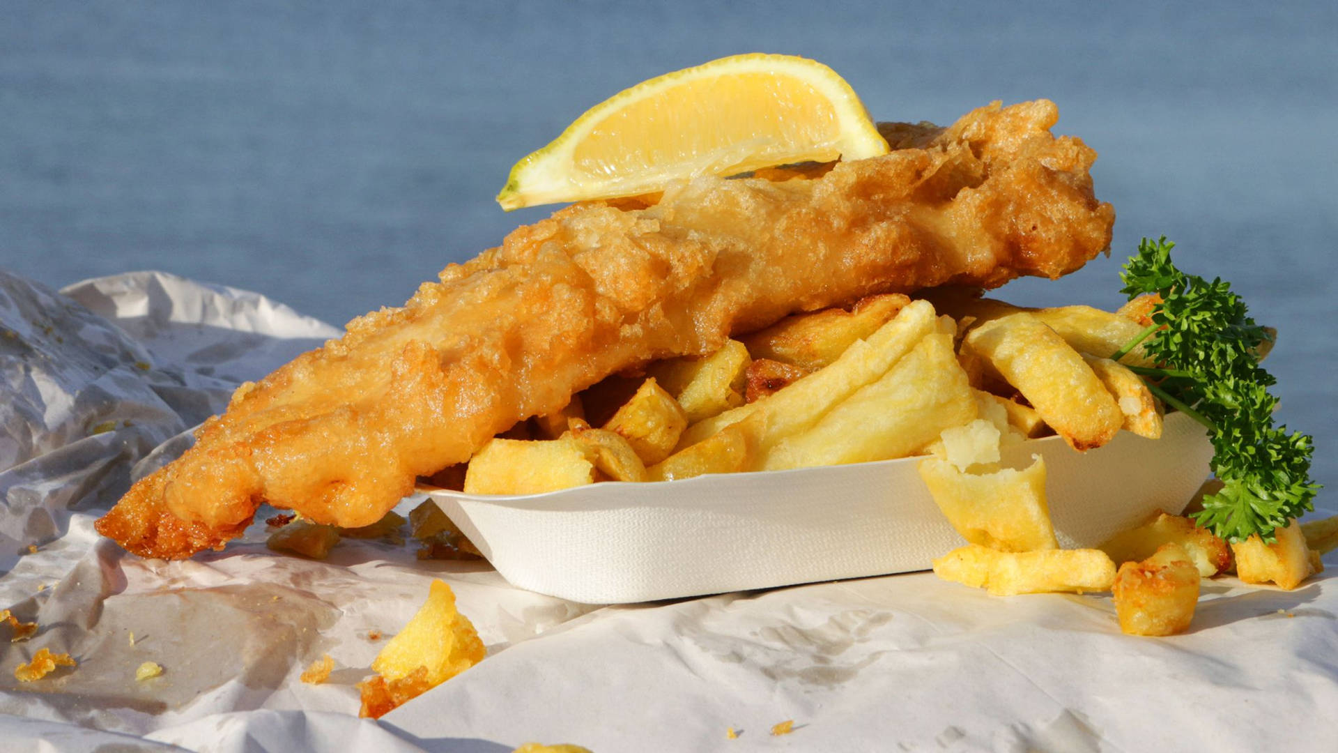 Caption: Delicious Golden-brown Fish And Chips