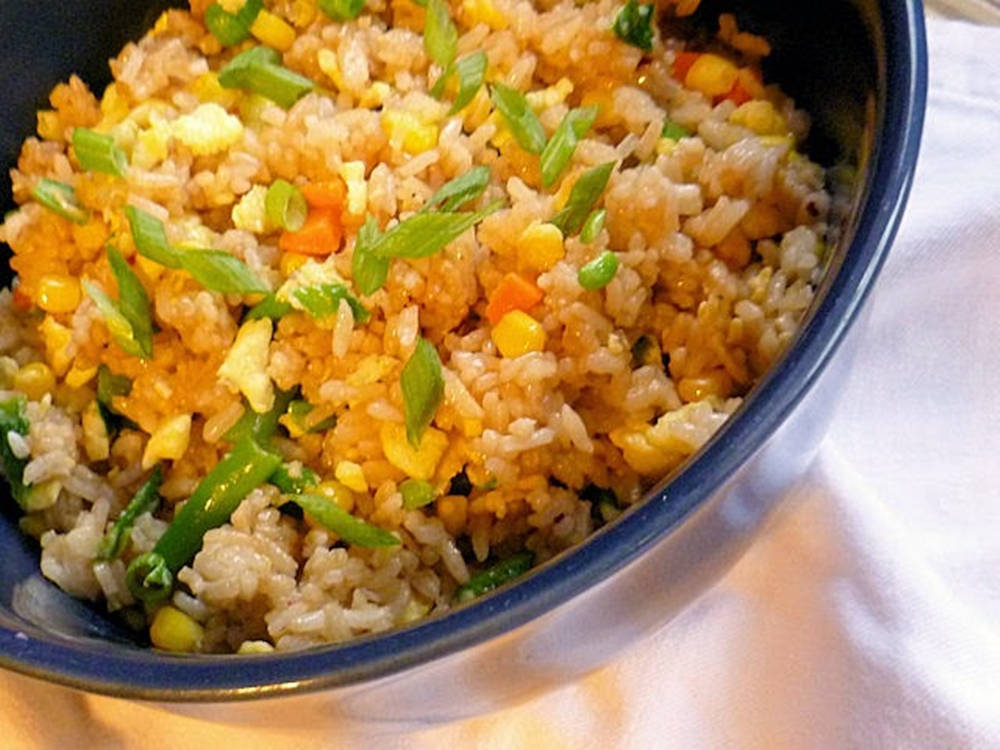 Caption: Delicious Home-cooked Fried Rice Background