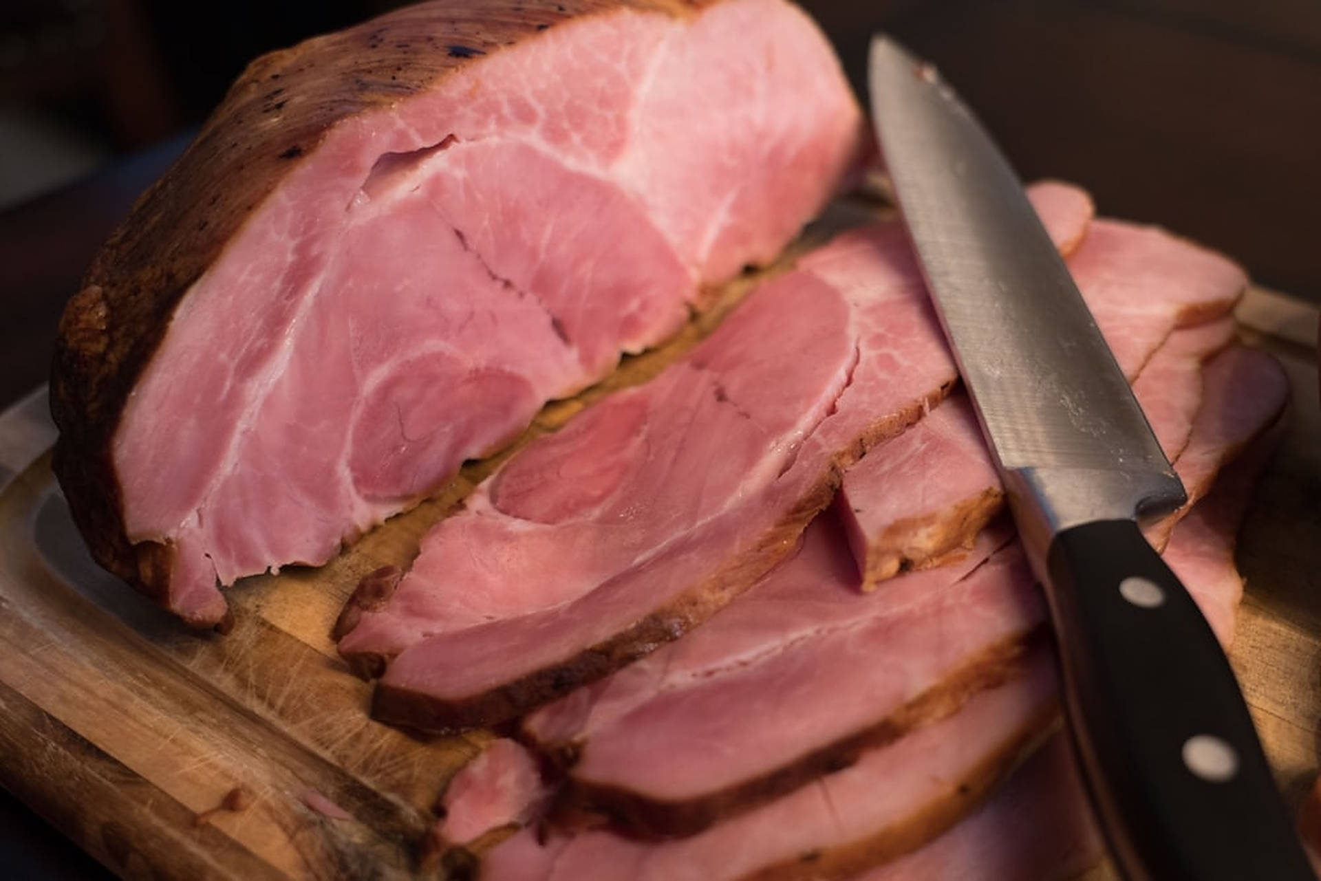 Caption: Delicious Medium Cooked Ham Background