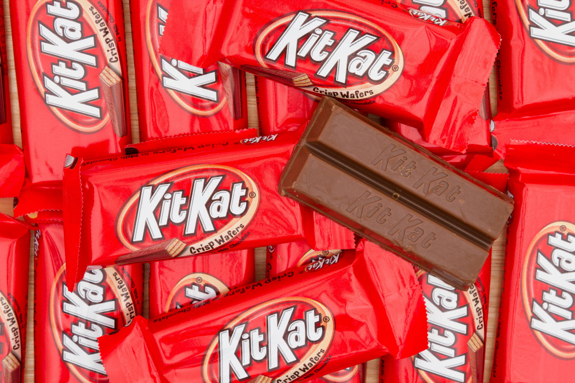 Caption: Delicious Stacks Of Kit Kat Chocolates Background