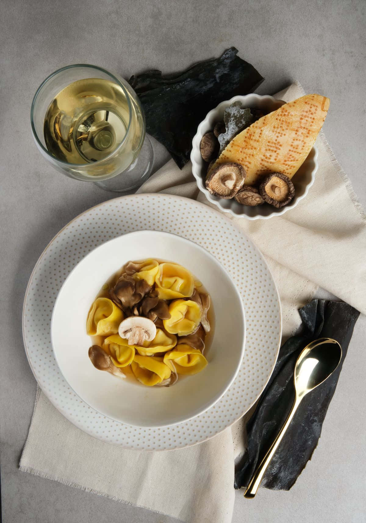 Caption: Delicious Tortellini In Brodo With Mushrooms Background