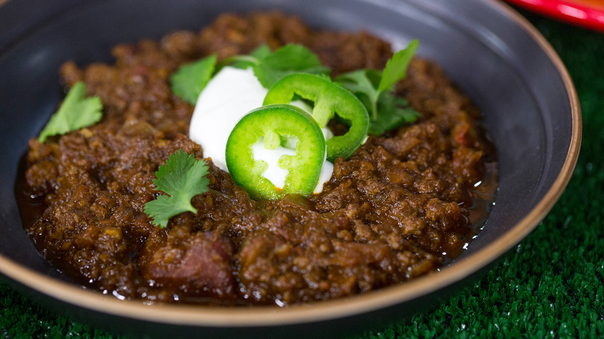 Caption: Delight In A Bowl - Authentic Chili Con Carne Background