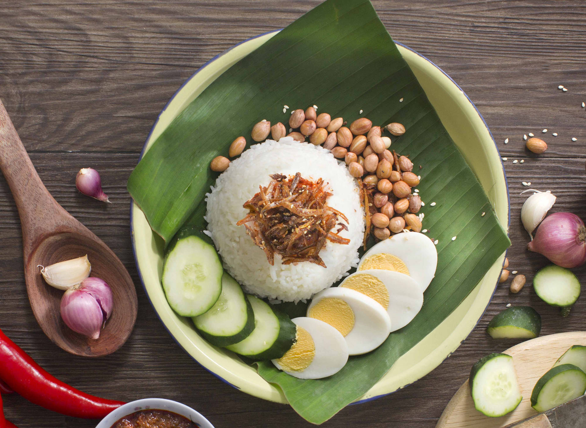 Caption: Delight In The Colors Of Malaysian Cuisine: Nasi Lemak Background