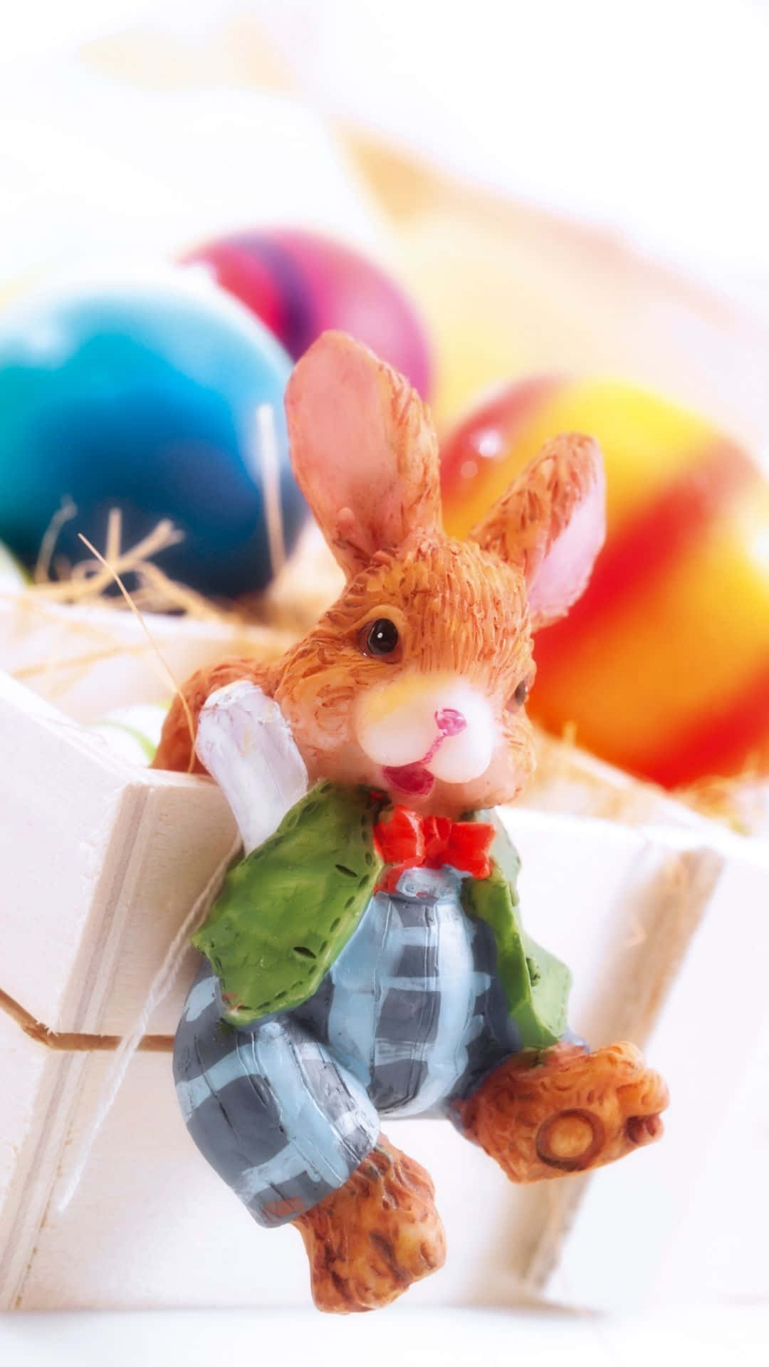 Caption: Delightful Easter Bunny With Colorful Eggs Background