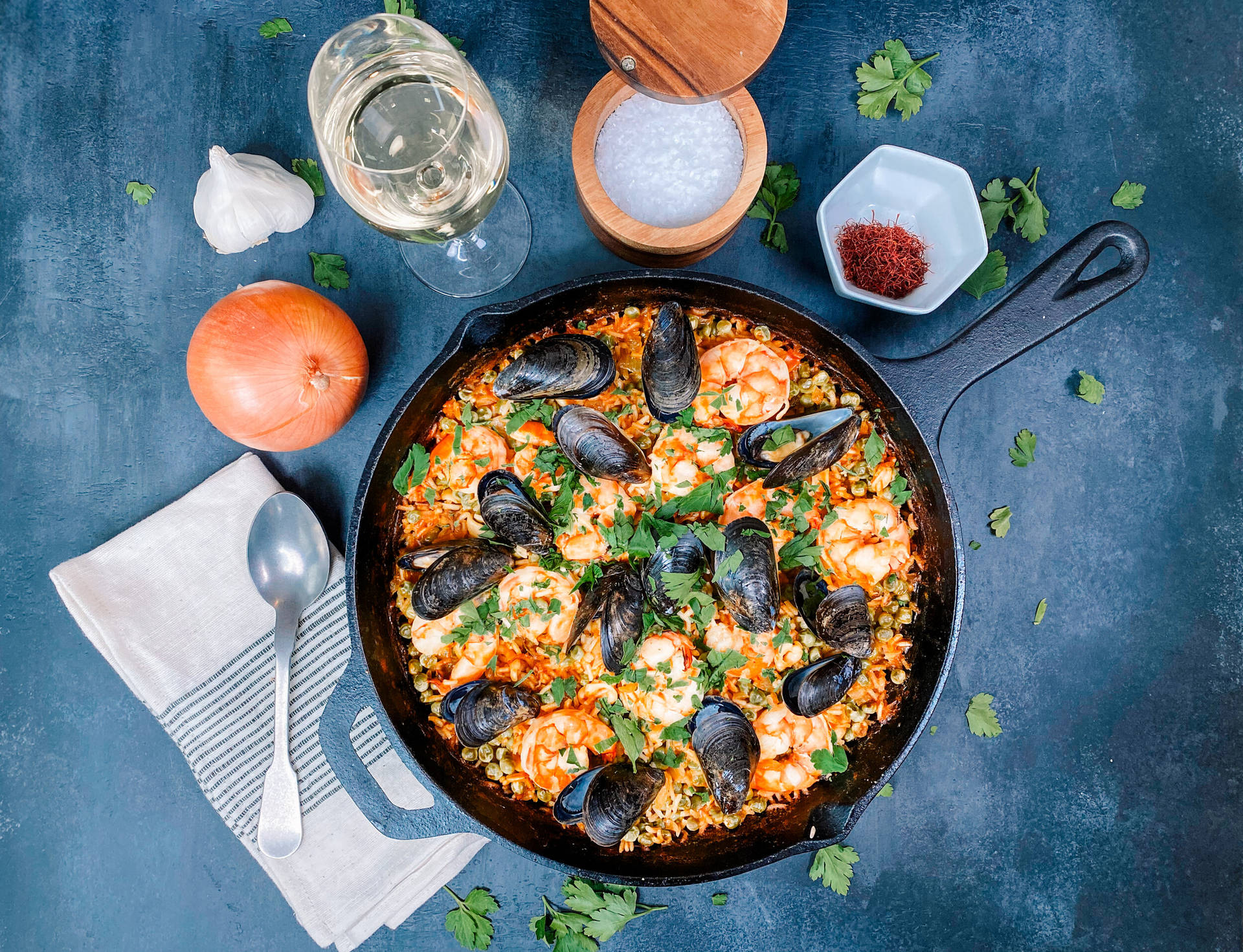 Caption: Delightful Seafood Paella In A Skillet Background