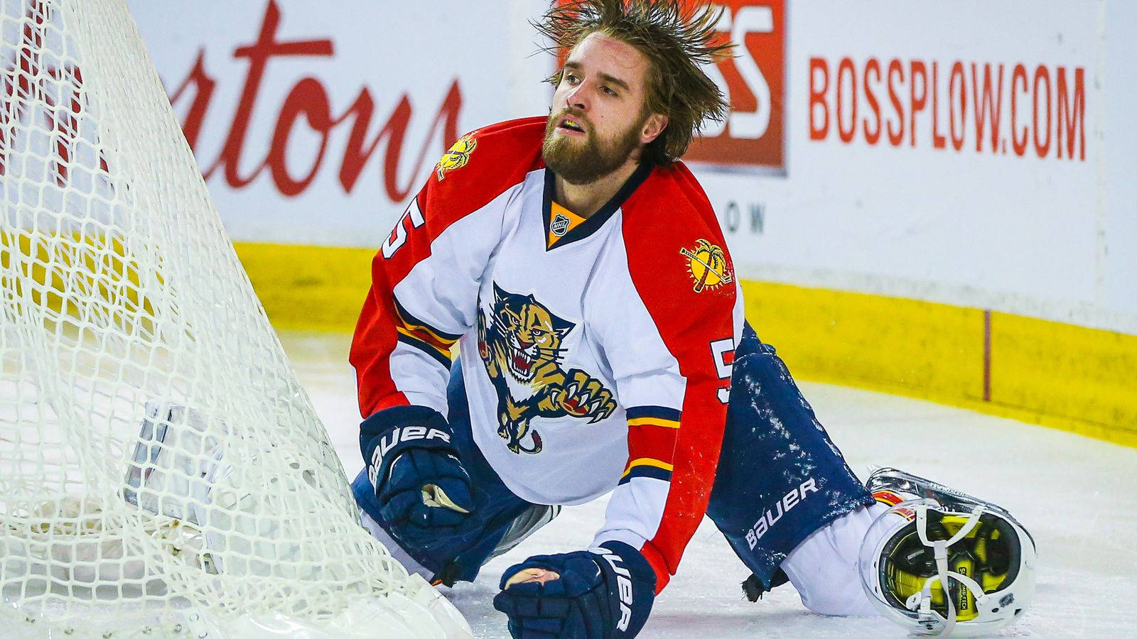 Caption: Determined Aaron Ekblad Of Florida Panthers Perfecting His Craft. Background