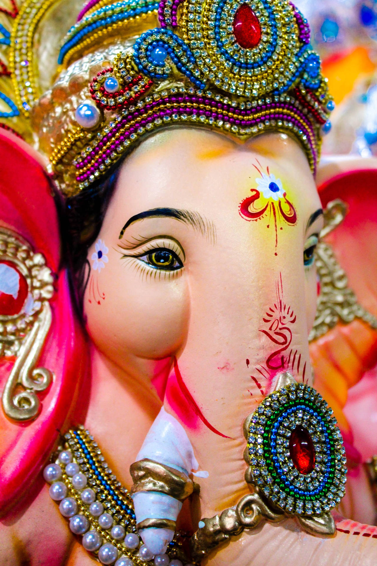 Caption: Divine Close-up Image Of Ganesh Ji In Hd Background