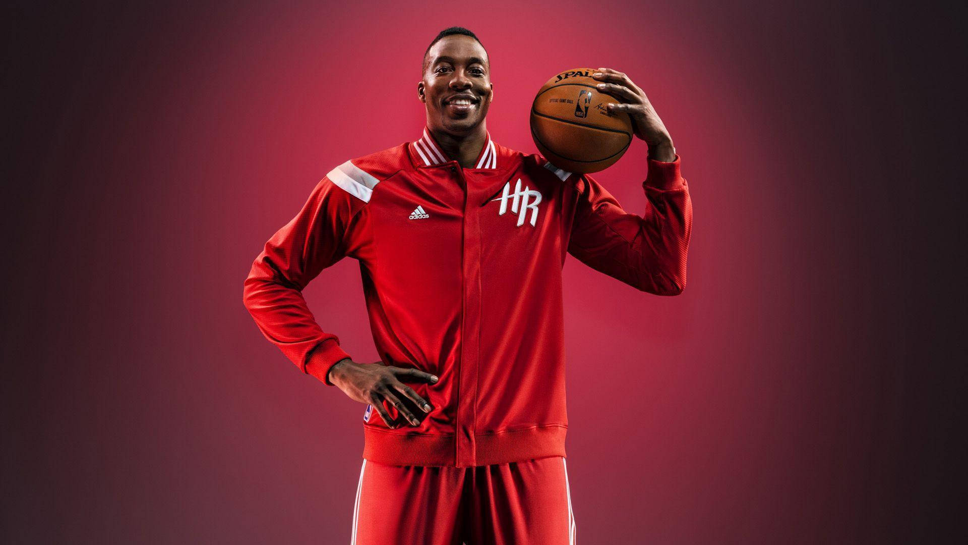 Caption: Dwight Howard Shooting A Slam Dunk Background