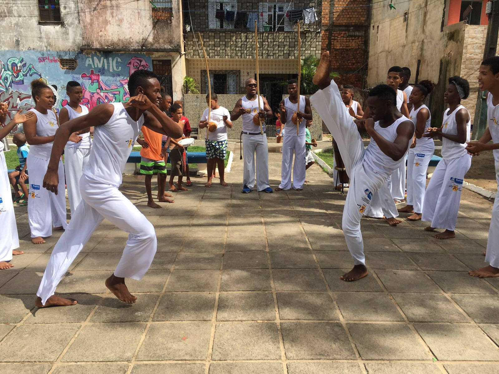 Caption: Dynamic Capoeira Street Sparring Dancing To Rhythm Background